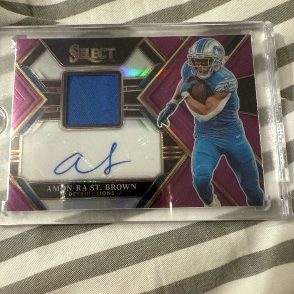 Panini Prizm Football Card - Amon-Ra St. Brown auto patch.# 49
